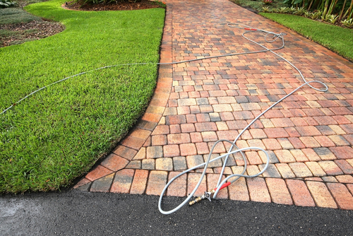 a cleaned driveway after pressure washing